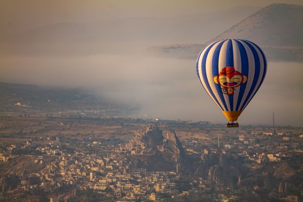 Balloon above Uçhisar Rock Castle