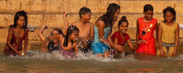 Children Playing in The River Ganges